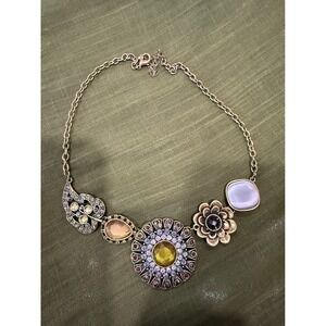 Park Lane bronze pendant necklace featuring a central medallion